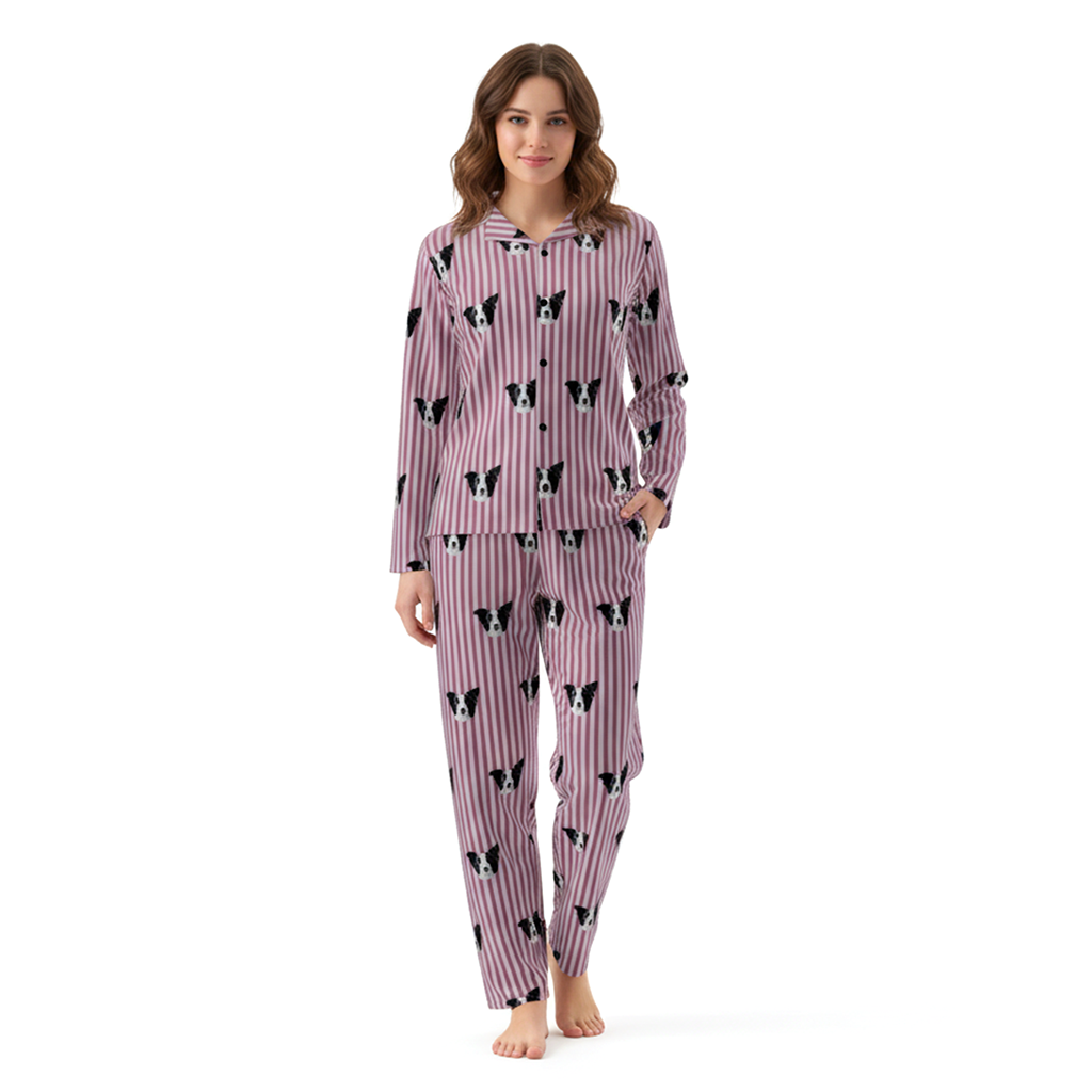 Woman wearing a pink pajama set with black and white dog pattern on a white background