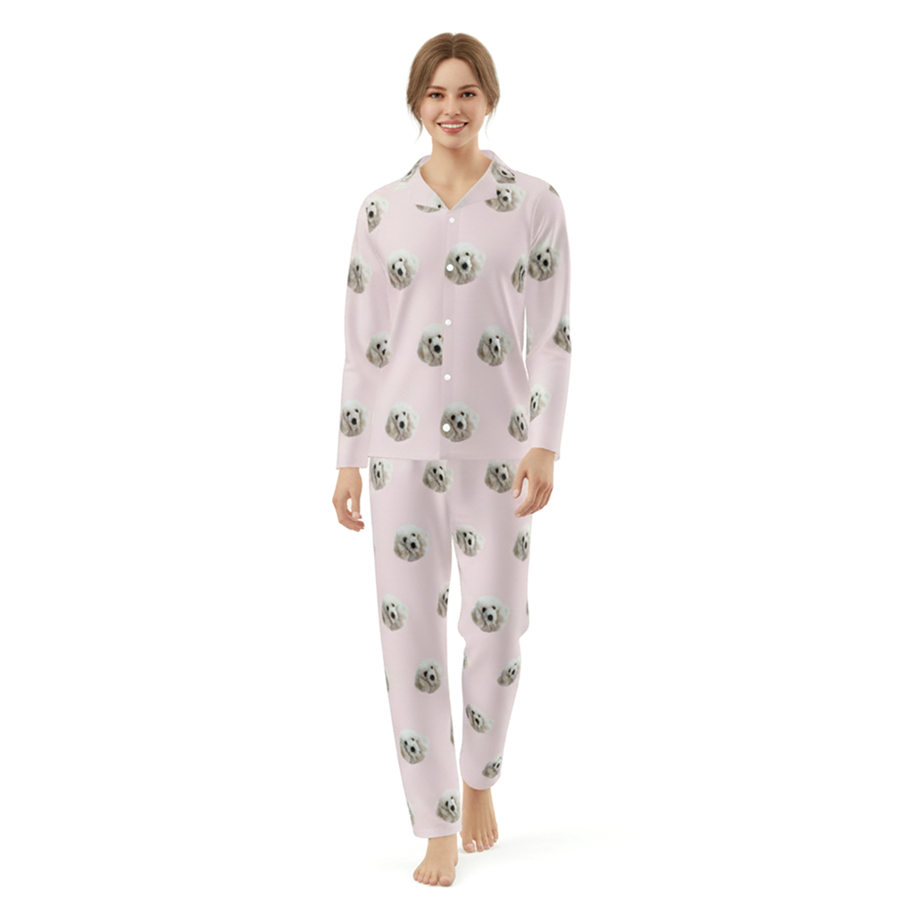 Woman wearing a pink pajama set with a pattern on a white background