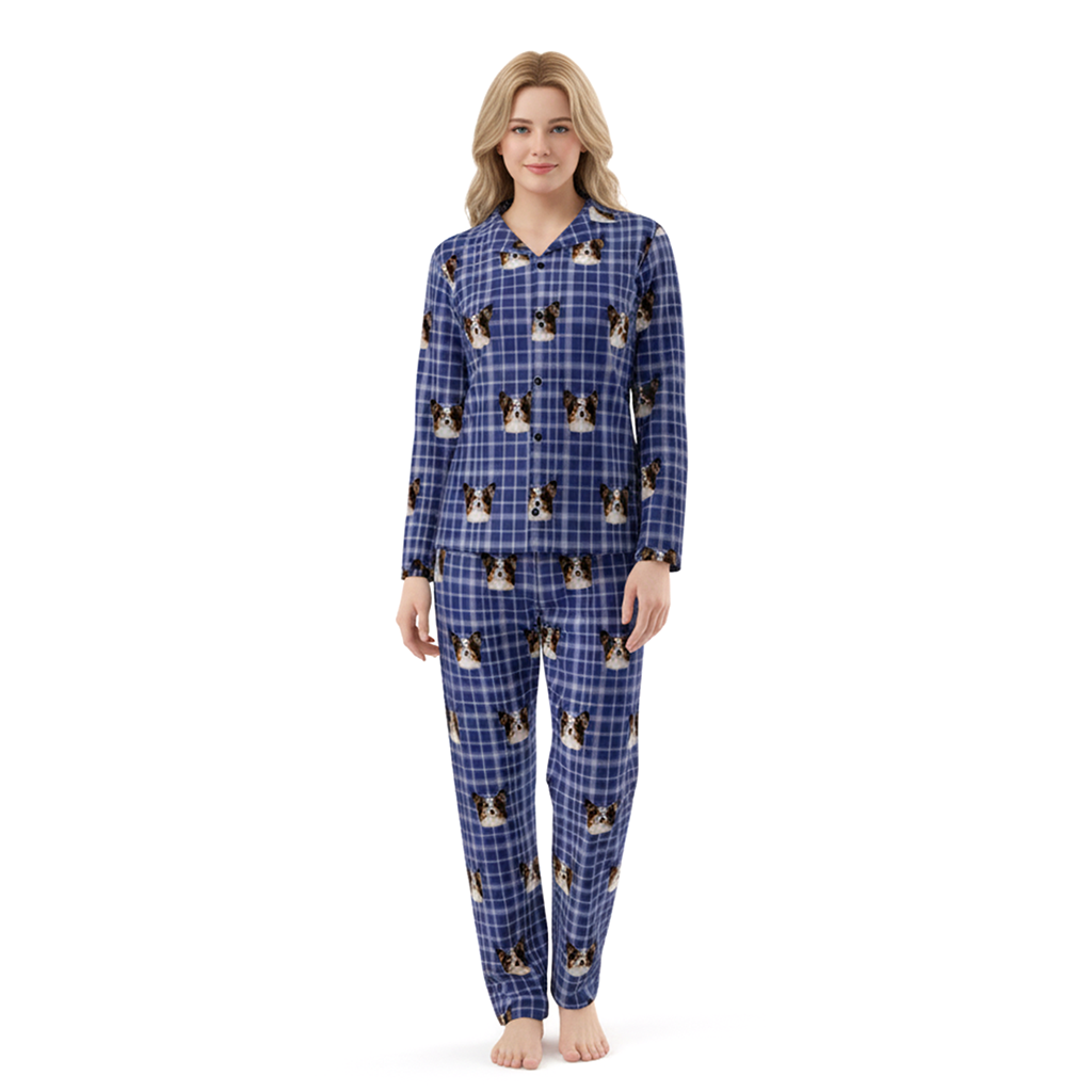 Woman wearing a blue plaid pajama set with dog pattern on a white background