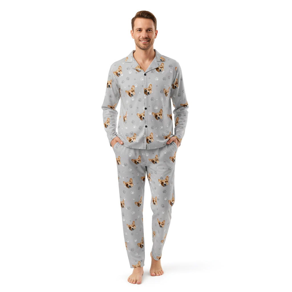 Man wearing a gray pajama set with dog pattern on a white background