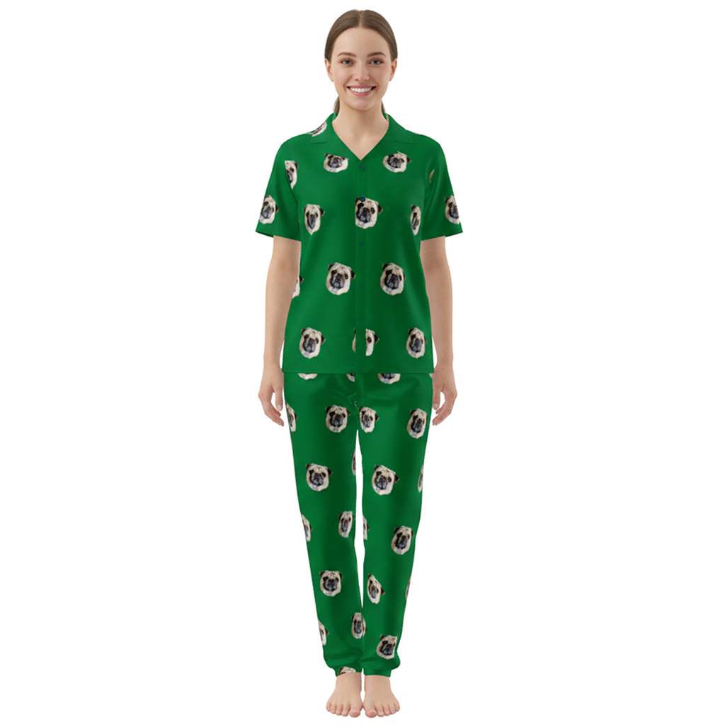 Woman wearing green pajamas with pug pattern on a white background