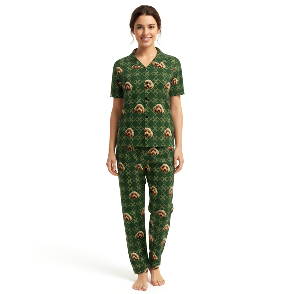 Woman wearing a green pajama set with a bear pattern on a white background