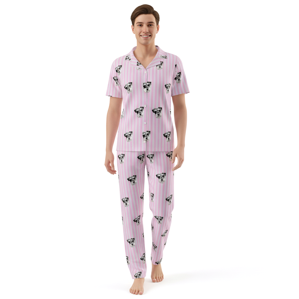 Person wearing a pink pajama set with black butterfly pattern on a white background