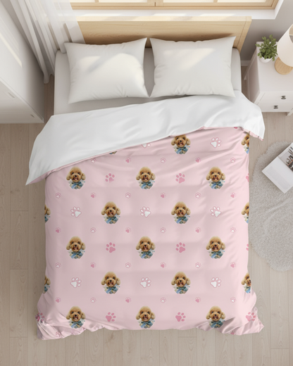 Pink bedspread with dog pattern on a neatly made bed in a bedroom.