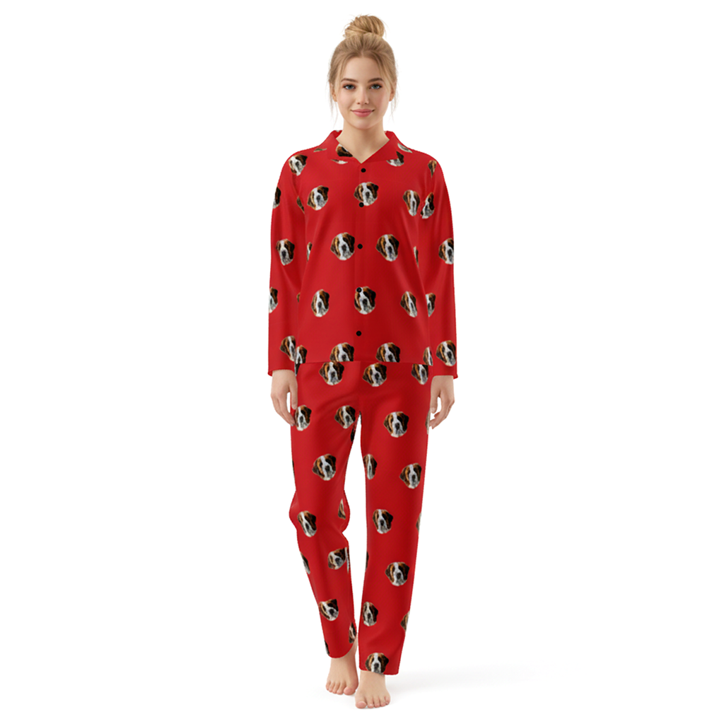 Person wearing a red pajama set with dog pattern on a white background