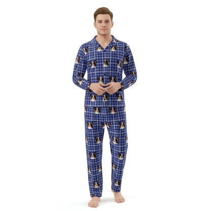 Man wearing a blue plaid pajama set with dog pattern on a white background