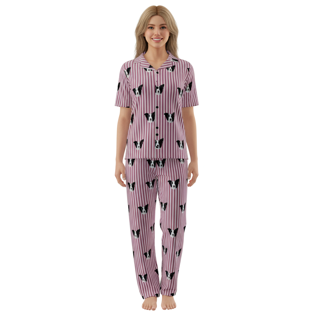 Woman wearing a pink pajama set with black and white patterns on a white background